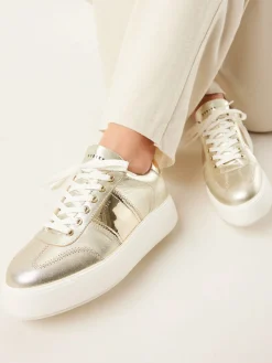 DAMES Nubikk Elise Wing Gouden Sneakers Voor Dames